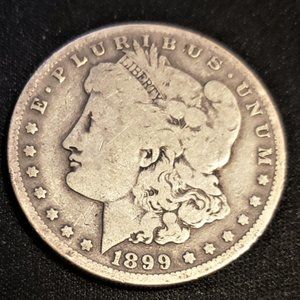 1899-O MORGAN SILVER DOLLAR